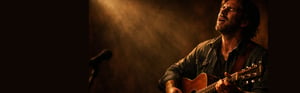 Soulful Musician Performing Acoustic Guitar at Dusk-1-1