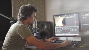 man editing a movie